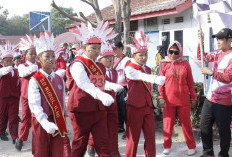 Gerak Jalan Meriahkan HUT RI ke-79 di Talang Kelapa, Ratusan Pelajar Bersemangat