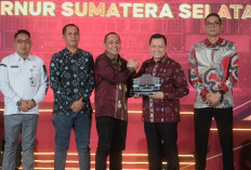 Keberhasilan Pilkada Sumsel 2024: Pj Gubernur Elen Setiadi Terima Penghargaan dari KPU