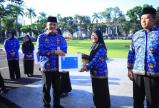 Apel Gabungan Korpri, Sekda Sumsel Serahkan Santunan pada 125 ASN Purnatugas