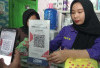 Belanja Praktis Pakai QRIS, NKHZ Baby Shop Tumbuh Bersama QR Code BRI